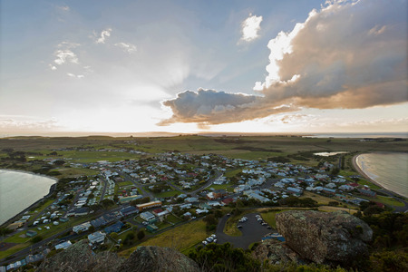 High angle view of peninsula and beaches on Bass sea Strait from Highfield Lookout on top of The Nut State Reserve Plateau tableland in Stanley, Tasmania, Australia. The nut is old volcanic plug of basalt with the height of 143 meters rising from ocean.の写真素材