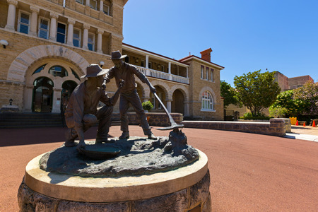 PERTH, AUSTRALIA - FEBRUARY 2018 : Bronze statue of The Strike, first discovery of gold in front of Perth Mint on Hay Street in Perth, Western Australia on February 24, 2018. Made by a sculptor, Greg Jamesのeditorial素材