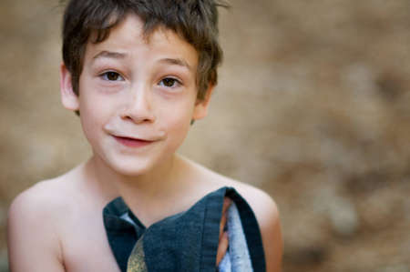 close up of a young child with a sweet expression on his face