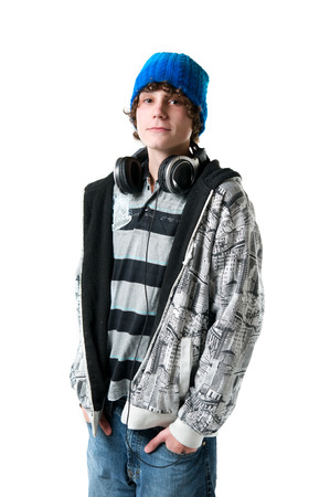 casually dressed teenage boy on a white backgroundの写真素材