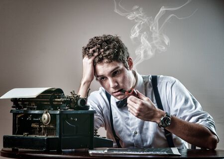 journalist with a vintage typewritter,bowtie, and pipe