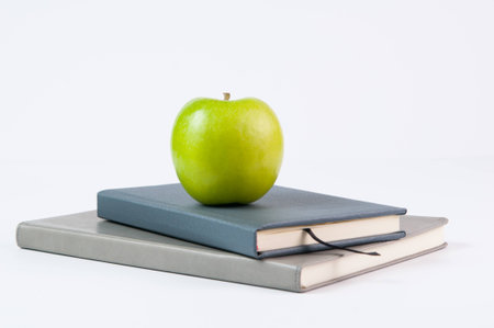 apple, books, and pencils for back to schoolの写真素材