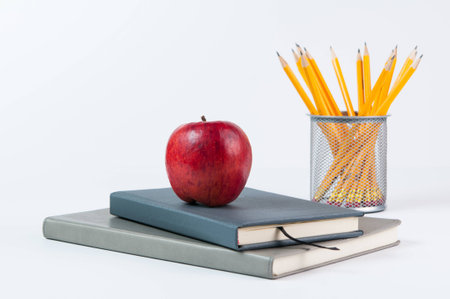 apple, books, and pencils for back to schoolの写真素材