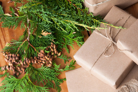 packages wrapped in brown papper and tied with string for Christmasの写真素材
