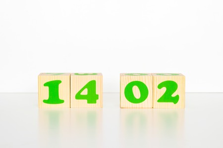 Wood cube with inscription 14 02 february Valentines Day isolated on a white background