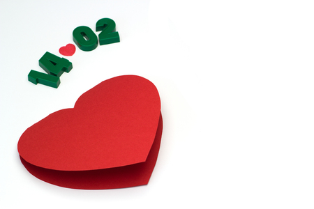 Red paper heart card Valentines day isolated on the white backgroundの写真素材