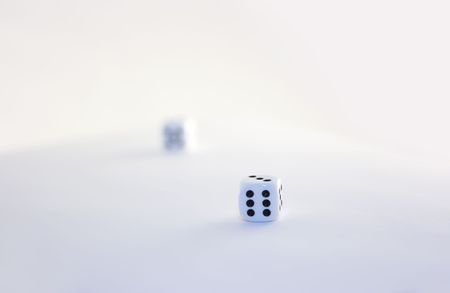 Two dices on white surfaceの写真素材