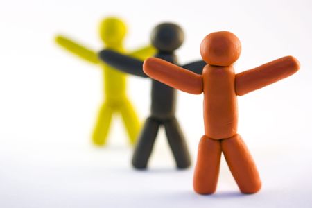 Three plasticine men standing isolated on white backgroundの写真素材