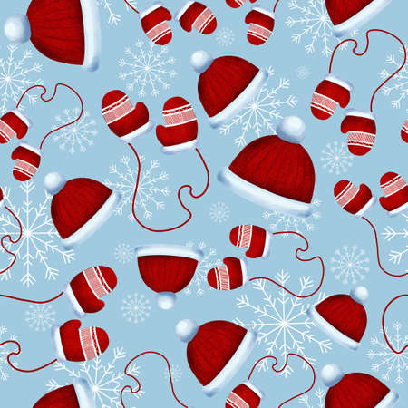 Digital winter background with mittens and hats. Warm winter things with fur on a gentle blue background with snowflakesの写真素材