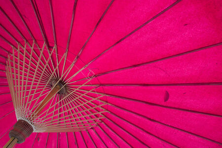 Structure under a pink umbrellaの写真素材