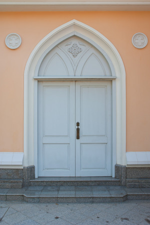Thai temple doors furnished sculptures Gothic style buildingの写真素材