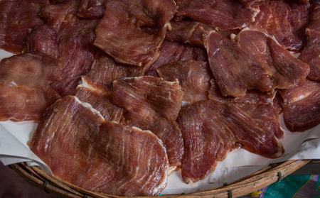 Pork drying in the sun, Thailand market.の写真素材