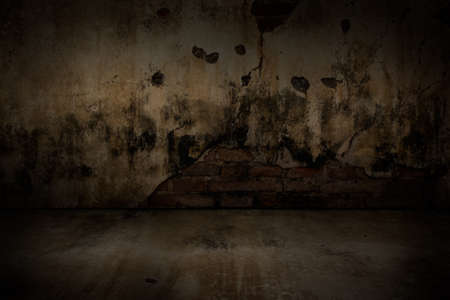 Old concrete wall and concrete cracking.の写真素材