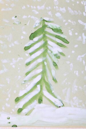 On the picture, made water-colour depicts a green tree, covered with snow の写真素材