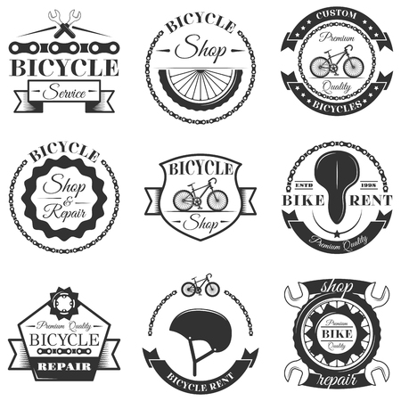 Vector set of bicycle repair shop labels and design elements in vintage black and white style. Bike logoのイラスト素材