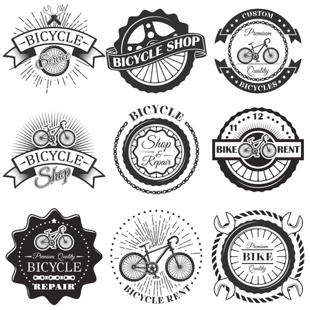 Vector set of bicycle repair shop labels and design elements in vintage black and white style. Bike logoのイラスト素材