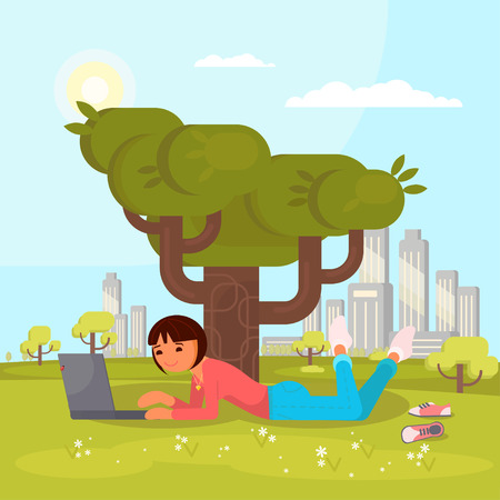 Vector illustration of young girl using laptop while lying on green grass in city park. Flat style design.のイラスト素材