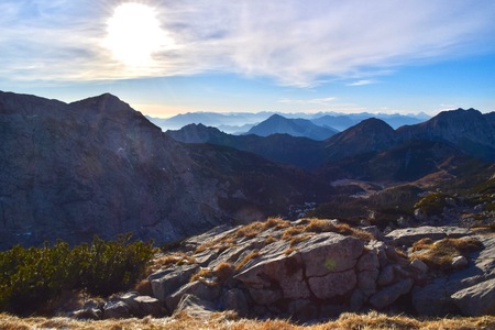 Sun rising above the mountainsの写真素材