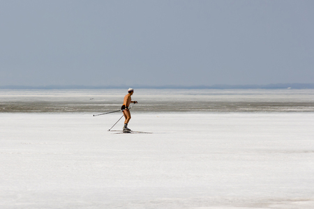Berdsk, Novosibirsk Oblast, Siberia, Ob River, Russia - April 17, 2016: a skier runs along the ice of the Ob Riverのeditorial素材
