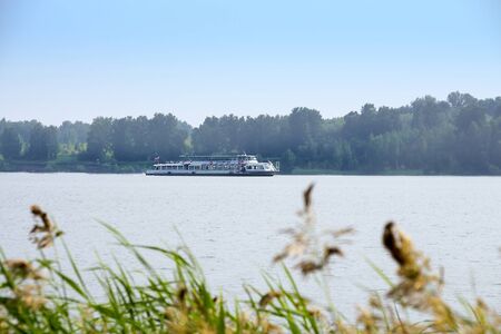 The river Berd, Novosibirsk oblast, Siberia, Russia - July 25, 2016: walking on a double-decked passenger river boat series Moscow 127のeditorial素材