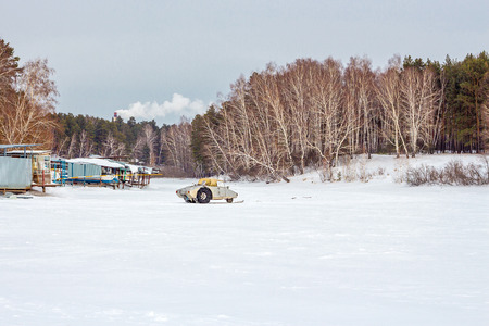 The river Split the Town of Berdsk, Novosibirsk oblast, Siberia, Russia - January 12, 2017: the snowy river and boat stationのeditorial素材