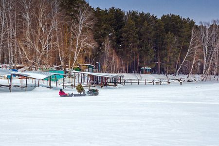 The river Split the Town of Berdsk, Novosibirsk oblast, Siberia, Russia - January 12, 2017: the snowy river and boat stationのeditorial素材