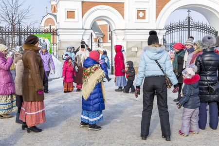 Berdsk, Novosibirsk oblast, Siberia, Russia - February 26, 2017: Russian holiday of Maslenitsa, national street festivities at the Churchのeditorial素材