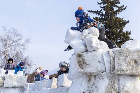 Berdsk, Novosibirsk oblast, Siberia, Russia - February 26, 2017: Russian holiday of Maslenitsa, national street festivities at the Churchのeditorial素材