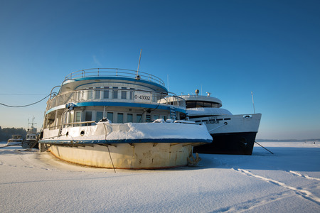 Berdskiy Bay, river Ave, Berdsk, Novosibirsk oblast, Siberia, Russia - January 2, 2018: the ship "Remix" on the dock in the winterのeditorial素材