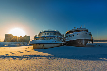 Berdskiy Bay, river Ave, Berdsk, Novosibirsk oblast, Siberia, Russia - January 2, 2018: the double-decked Passenger river ship "Viktor Gashkov" at the winter Parking lot at the pierのeditorial素材