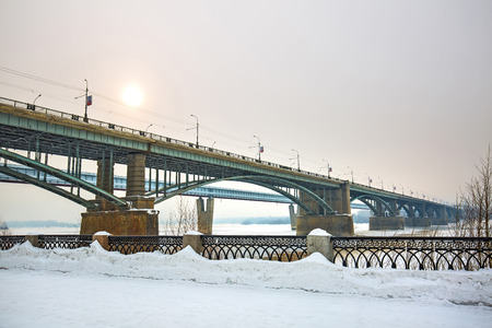 Novosibirsk, Siberia, Russia - Feb 4, 2018: indoor Novosibirsk metro bridge and October bridge over the Ob river in winterのeditorial素材