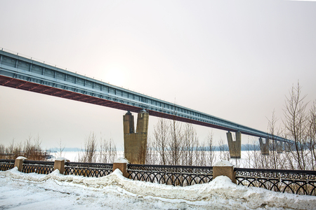 Novosibirsk, Siberia, Russia-February 4, 2018: Novosibirsk covered metro bridge over the Ob river in winterのeditorial素材