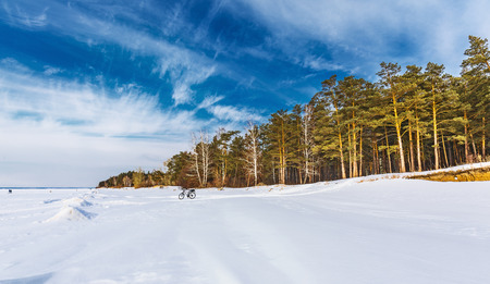 Snow-covered Ob sea on a Sunny day in March. Ob reservoir, Novosibirsk region, Western Siberia, Russiaの写真素材