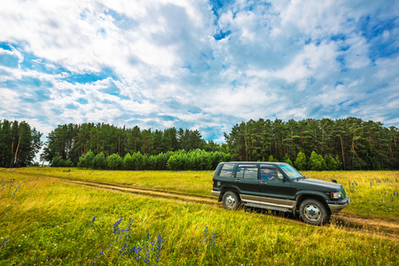 Ust-Khmelevka village, Novosibirsk region, Western Siberia, Russia-July 21,2018: 
car on a rural roadのeditorial素材