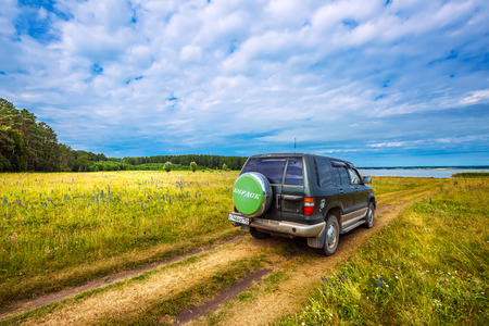Ust-Khmelevka village, Novosibirsk region, Western Siberia, Russia-July 21,2018: 
car on a rural roadのeditorial素材