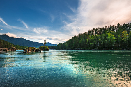 Mountain river Katun surrounded by mountains at sunset. Mountain Altai, Southern Siberia, Russiaの写真素材
