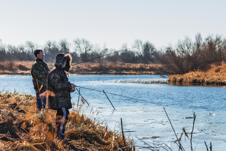 Chik river, Kolyvan district, Novosibirsk region, Western Siberia, Russia-October 27, 2018: fisherman on autumn river fishing spinningのeditorial素材