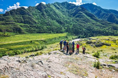 Petroglyph complex "kalbak - Tash" (ritual sanctuary), Ongudai district, Altai Republic, Russia - July 15, 2019: tourists watch rock paintingsのeditorial素材
