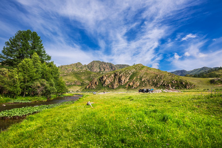 Tuekta river, Chui tract, Altai Republic, Russia - July 13, 2019: view of the Tuekta mountain river and the Chui Federal highwayのeditorial素材