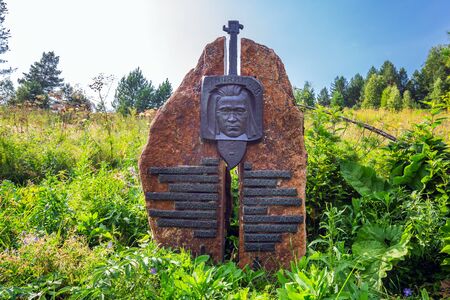 The area of the village Elekmonar, the tract of the Kuyum river, Chemalsky district, Altai Republic, South Siberia, Russia - August 15, 2019: monument on the grave of Anokhin Andrey Viktorovich near, Soviet scientist-ethnographer, composer, founder of proのeditorial素材