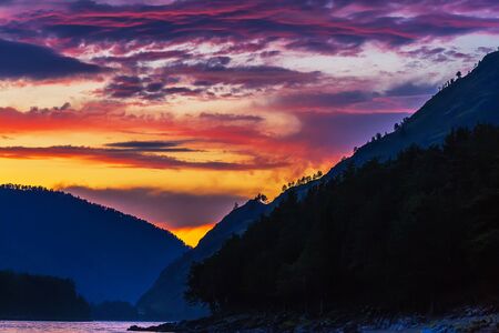 Katun river with beautiful clouds during the summer sunset.Chemalsky district, Altai Republic, South Siberia, Russiaの写真素材
