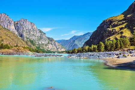 View of the mountain valley with the river. Katun river, unfinished Katun hydroelectric station district, Chemalsky district, Altai Republic, southern Siberia, Russiaの写真素材