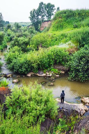Lushniki village, suzunsky district, Novosibirsk oblast, Western Siberia, Russia-July 24, 2019: Nizhny Suzun river with rural children on a fishing tripのeditorial素材