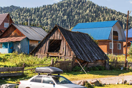 Artybash village, Turochaksky district, Altai Republic, Russia-August 20, 2020: private buildings on the shore of lake Teletskoyeのeditorial素材