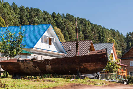 Artybash village, Turochaksky district, Altai Republic, Russia-August 20, 2020: private buildings on the shore of lake Teletskoyeのeditorial素材