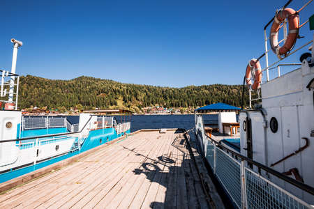 Iogach village, Turochaksky district, Altai Republic, Russia-August 20, 2020: Marina with boats in iogach villageのeditorial素材