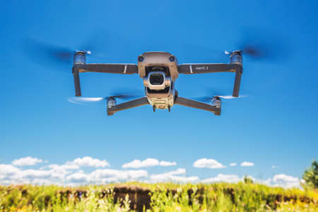 BERDSK, Novosibirsk Region, Western Siberia of Russia-July 8, 2021: a soaring quadcopter over the...