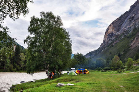 The Chuya River on a cloudy summer evening. Ongudaysky district of Gorny Altai, Russiaの写真素材