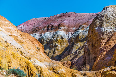 Martian landscapes of Kyzyl-Chin. Multicolored mountains near the village of Chagan-Uzun in the...