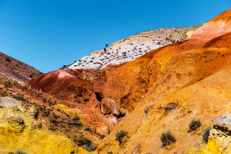 Martian landscapes of Kyzyl-Chin. Multicolored mountains near the village of Chagan-Uzun in the Kosh-Agach district of the Altai Republic. Russia, Southern Siberiaの写真素材
